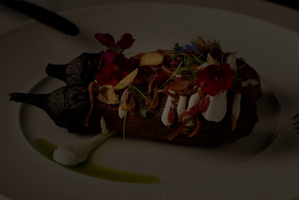 Perse Restaurant presents artfully decorated garnished kasho-bademjun.