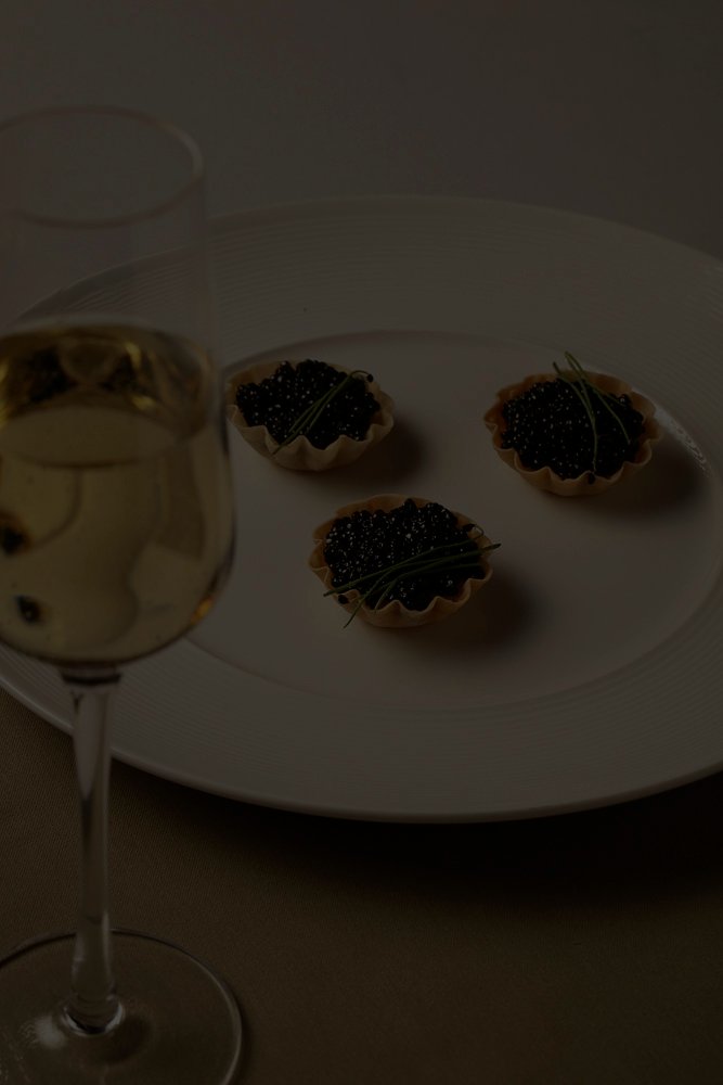 Perse Imperial Caviar served with champagne.