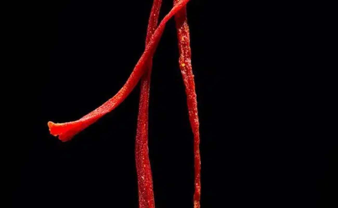 saffron strings on black backgrounds